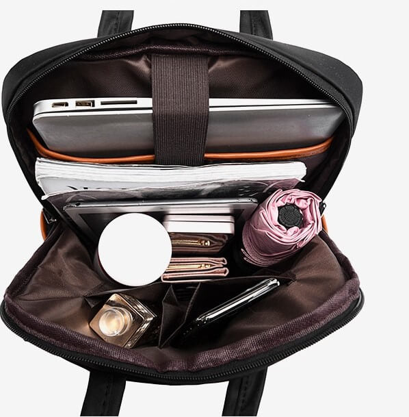 Pink water-resistant anti-theft school bag, stylish & secure for students daily use.