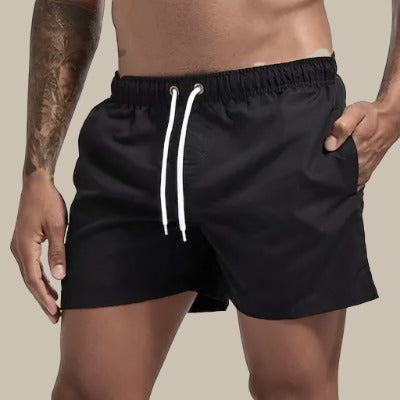 Modern men's quick-dry swim shorts. Stylish summer fashion & casual shorts for beach & pool.