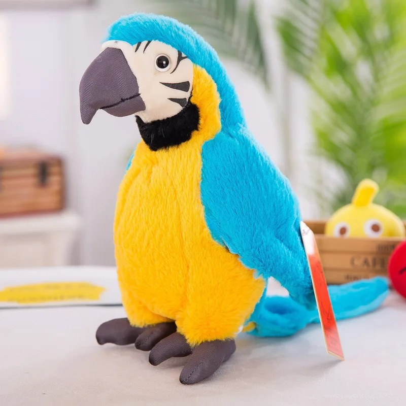 Happy child giggling while interacting with an educational talking parrot plush toy.