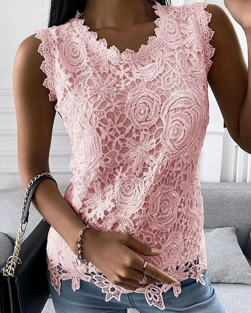 Chic elegant sleeveless women's blouse with delicate lace details, perfect for summer fashion or smart casual wear.