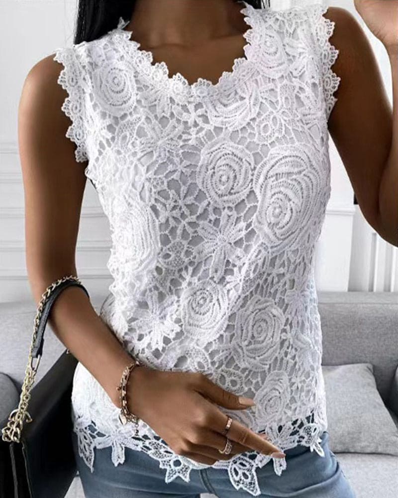 Elegant women's sleeveless blouse with delicate lace details, perfect for business casual or summer fashion.