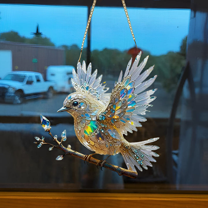 Acrylic bluebird suncatcher creating a beautiful stained glass effect on windows