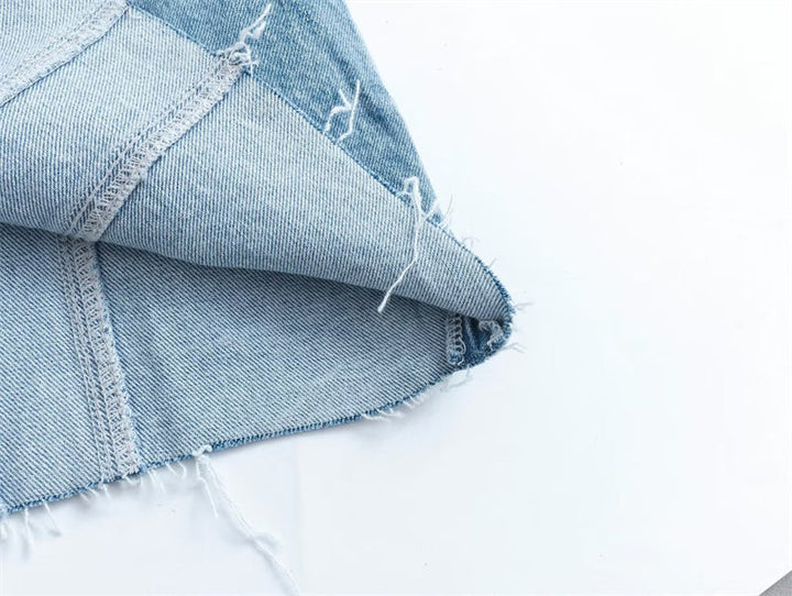 Elegant strapless design of a women's denim mini dress, perfect for chic casual or party looks. Sleeveless.