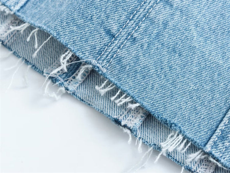 Fashionable women's mini denim dress with strapless design. A chic choice for casual or party wear.