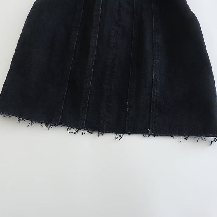 Women's strapless denim mini dress in bright light, showcasing its chic style for casual or party events.