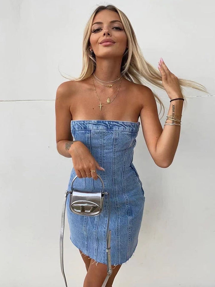 Back view of a trendy women's strapless denim mini dress. Exposed zipper detail, ideal for casual & party fashion.