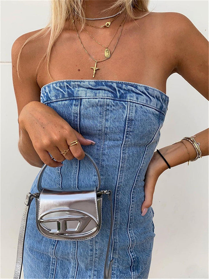 Side profile of a stylish women's strapless denim mini dress. Versatile for chic casual or party wear clothing.