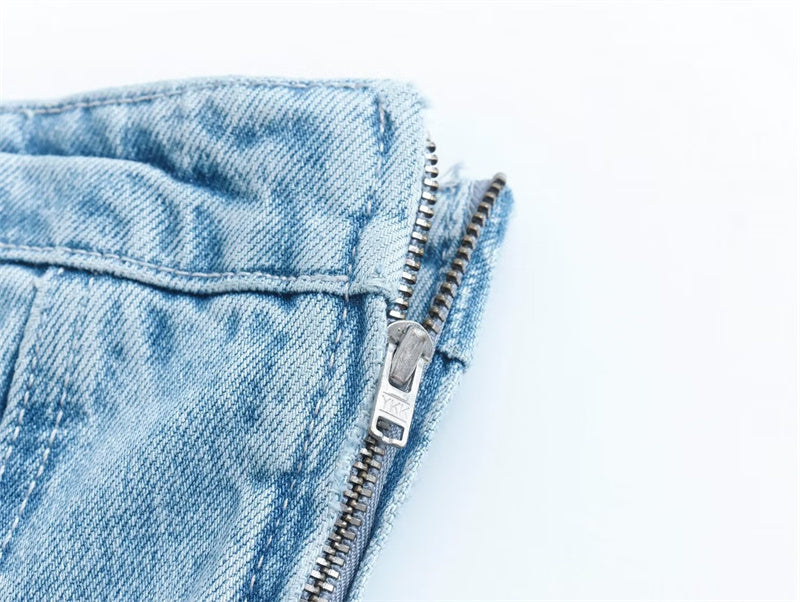 Bobbie strapless denim mini dress on a mannequin. Chic women's clothing, suitable for casual or party.