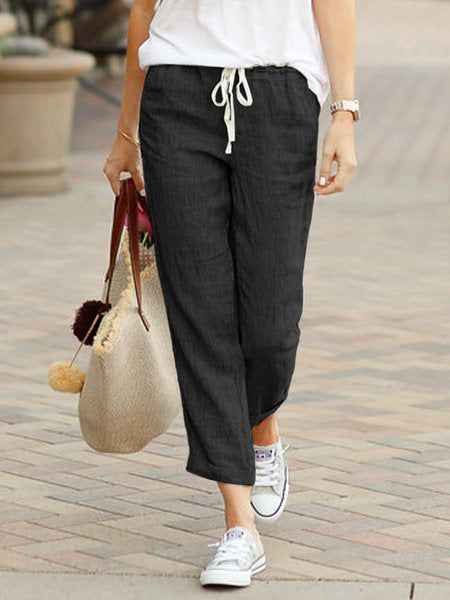 Stylish women's ankle-length cropped linen pants with comfortable drawstring, versatile for casual & everyday wear.