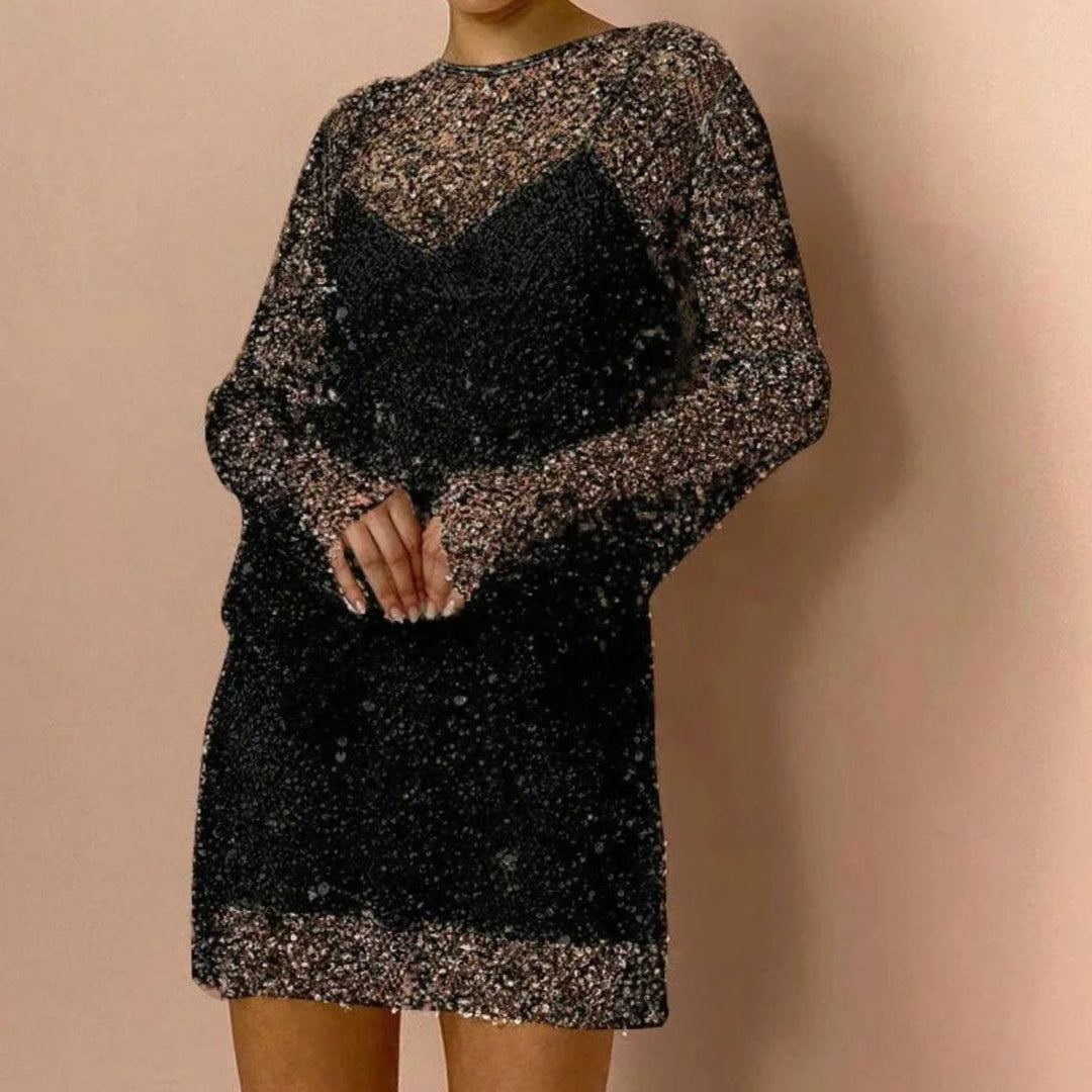 Women's sparkly long sleeve mini sequin party dress. Perfect for evening events, cocktails & celebrations.