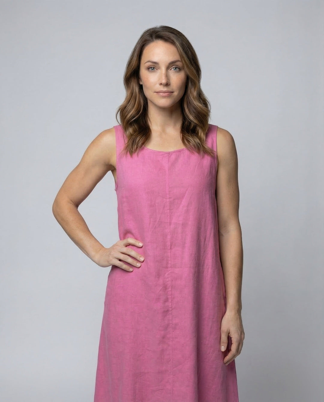 Comfortable relaxed fit sleeveless A-line maxi dress for women, featuring practical pockets.