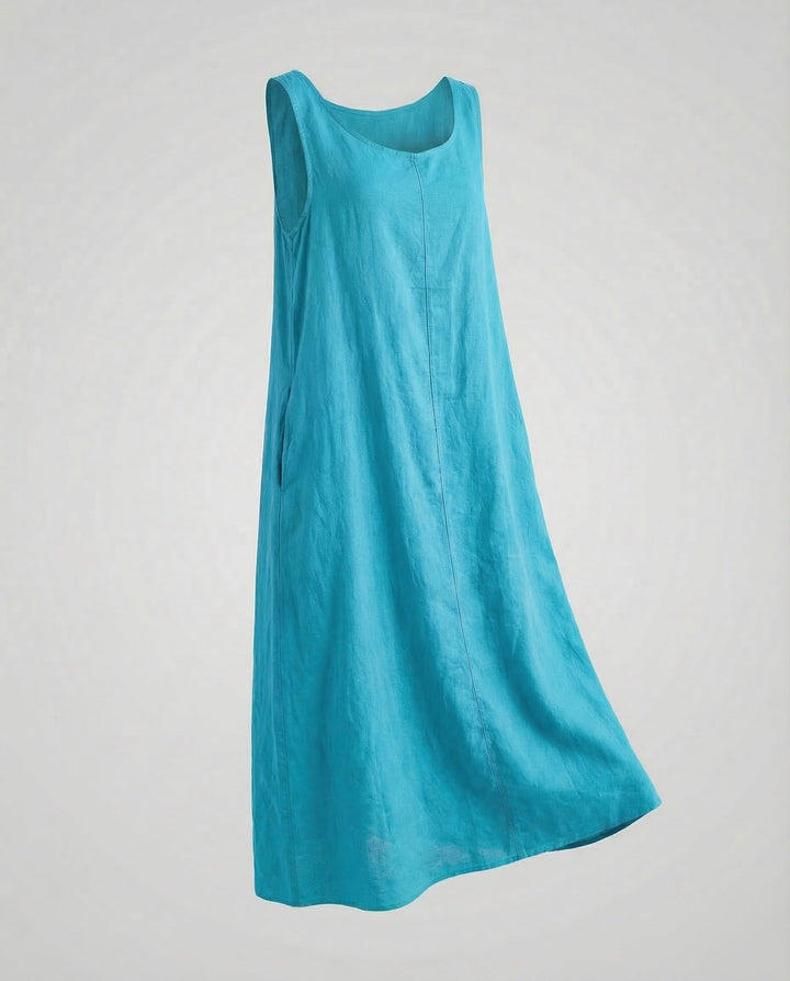 Full length shot of women's A-line sleeveless maxi dress with pockets, showcasing its relaxed fit.