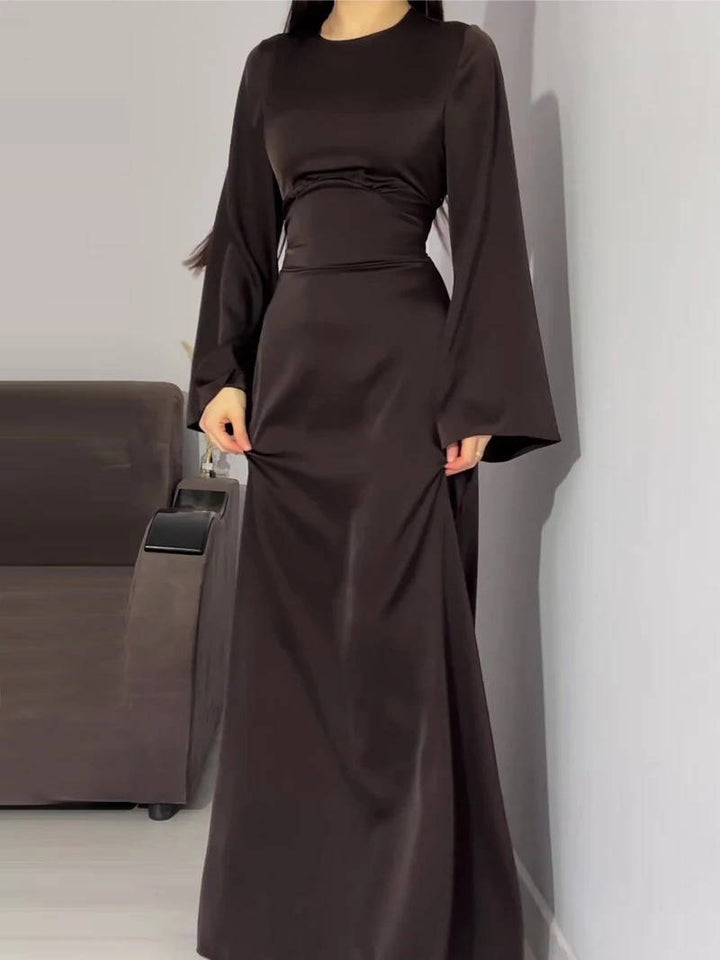 Women's sophisticated long party dress, a maxi gown with beautiful flared sleeves.