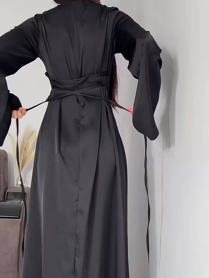 Formal wear maxi dress for women, designed with chic flared sleeves, ideal for events.