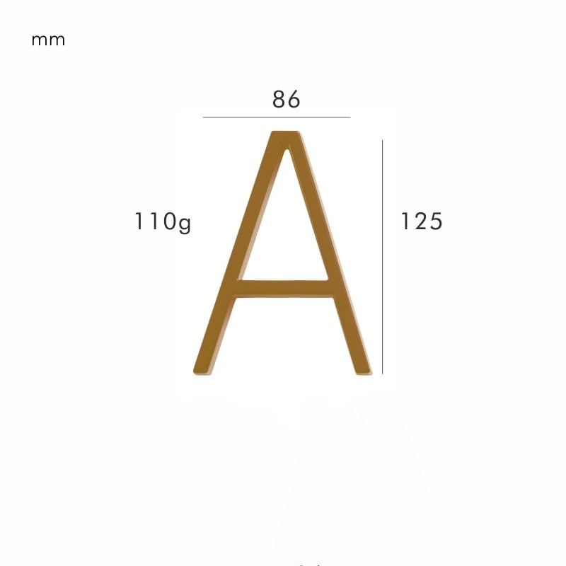 Sophisticated satin brass house number for exterior walls, improving home's curb appeal.