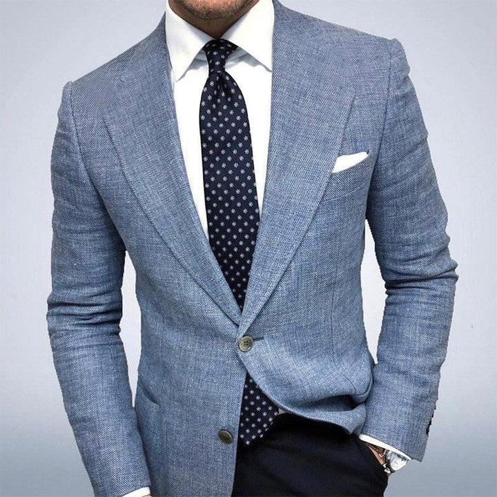 Men's tailored blazer jacket in textured fabric, perfect for smart casual or business attire. Refined style.