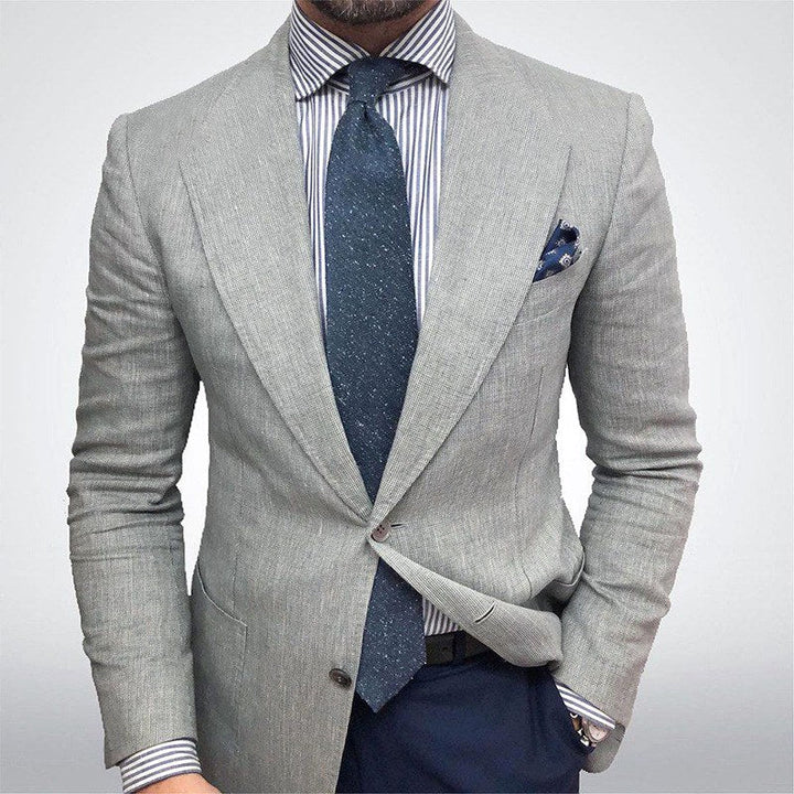 Modern men's textured tailored blazer jacket. Versatile smart suit for formal events, office or casual fashion.