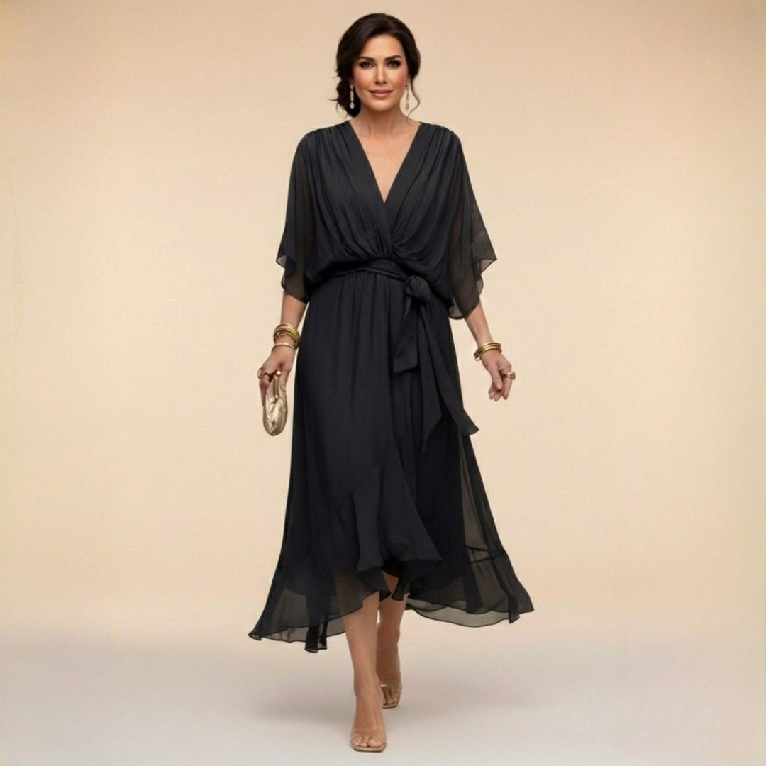 Elegant green Women's V-Neck Flowing Midi Dress. Versatile for casual or party wear, with a comfortable adjustable waist.