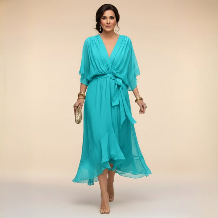 Versatile Women's V-Neck Flowing Midi Dress. This elegant dress with an adjustable waist suits casual or party wear.