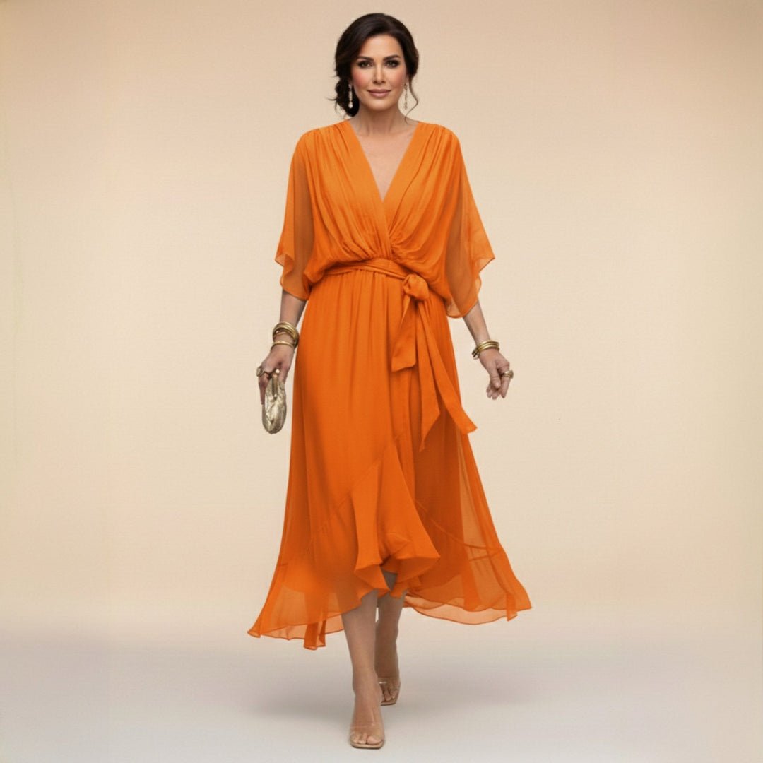 Close-up of a Women's V-Neck Flowing Midi Dress, highlighting the adjustable waist for a flattering, comfortable fit.