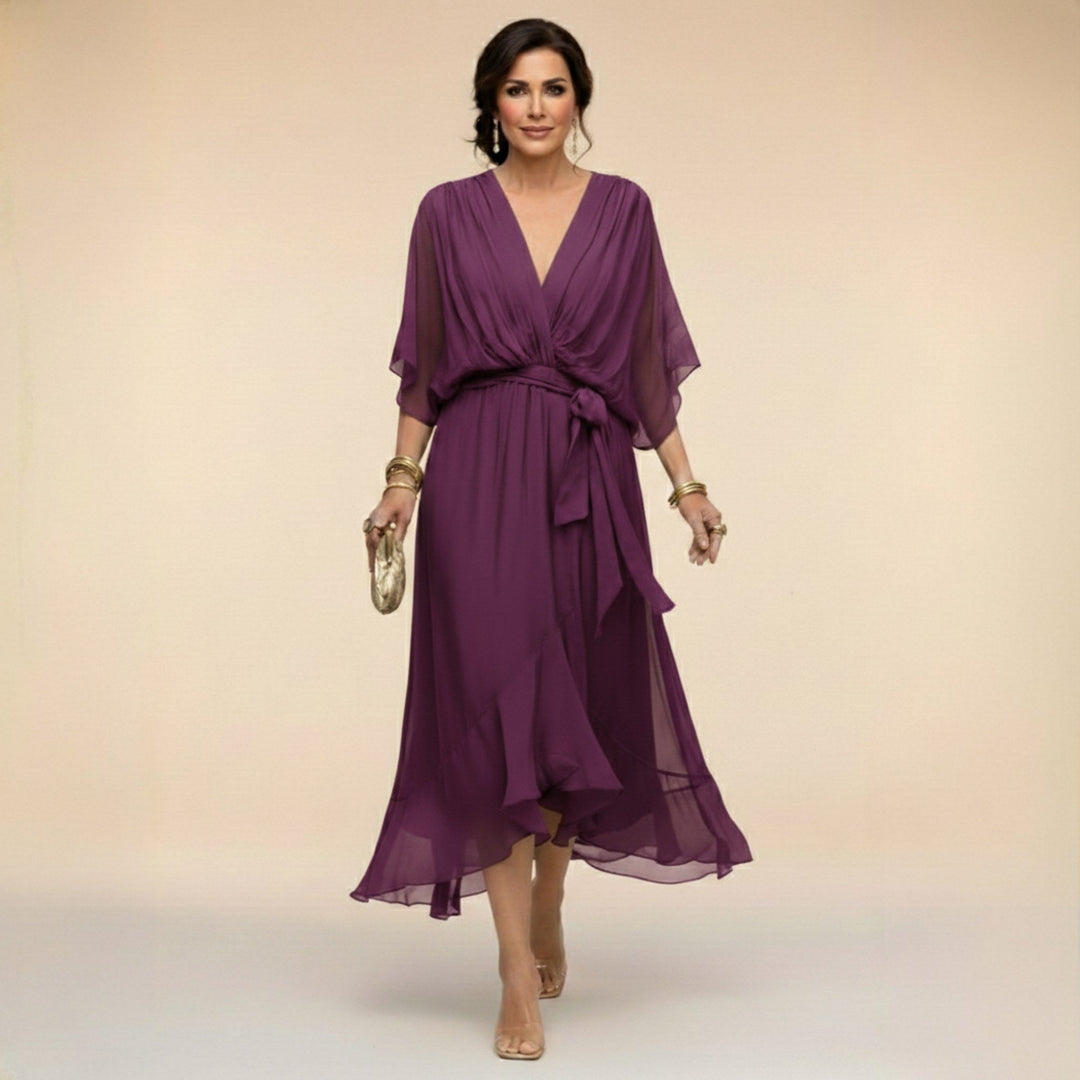 Classic black V-Neck Flowing Midi Dress for women. Elegant design with a comfortable adjustable waist, perfect for summer.