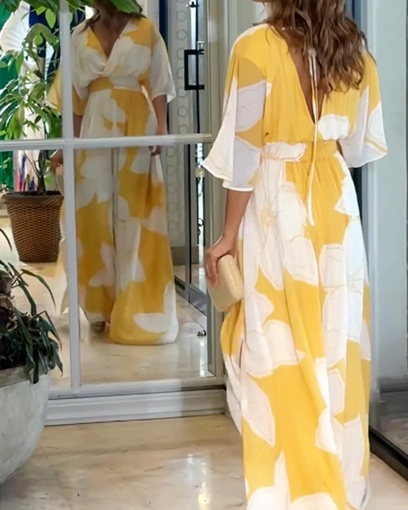 Chic women's vibrant floral midi dress, a versatile spring/summer fashion statement with an elegant day-to-night design.