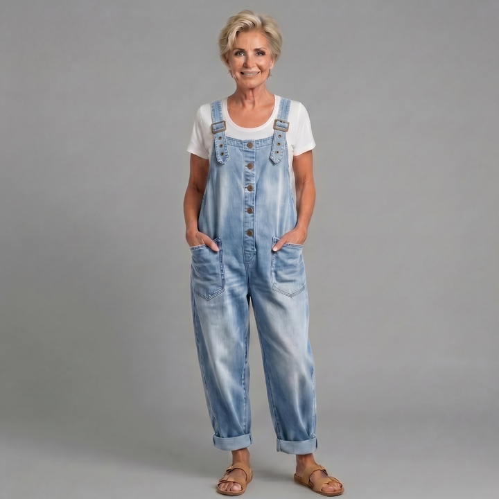 Woman wearing relaxed fit denim bib overalls, comfortable and stylish for daily casual wear.