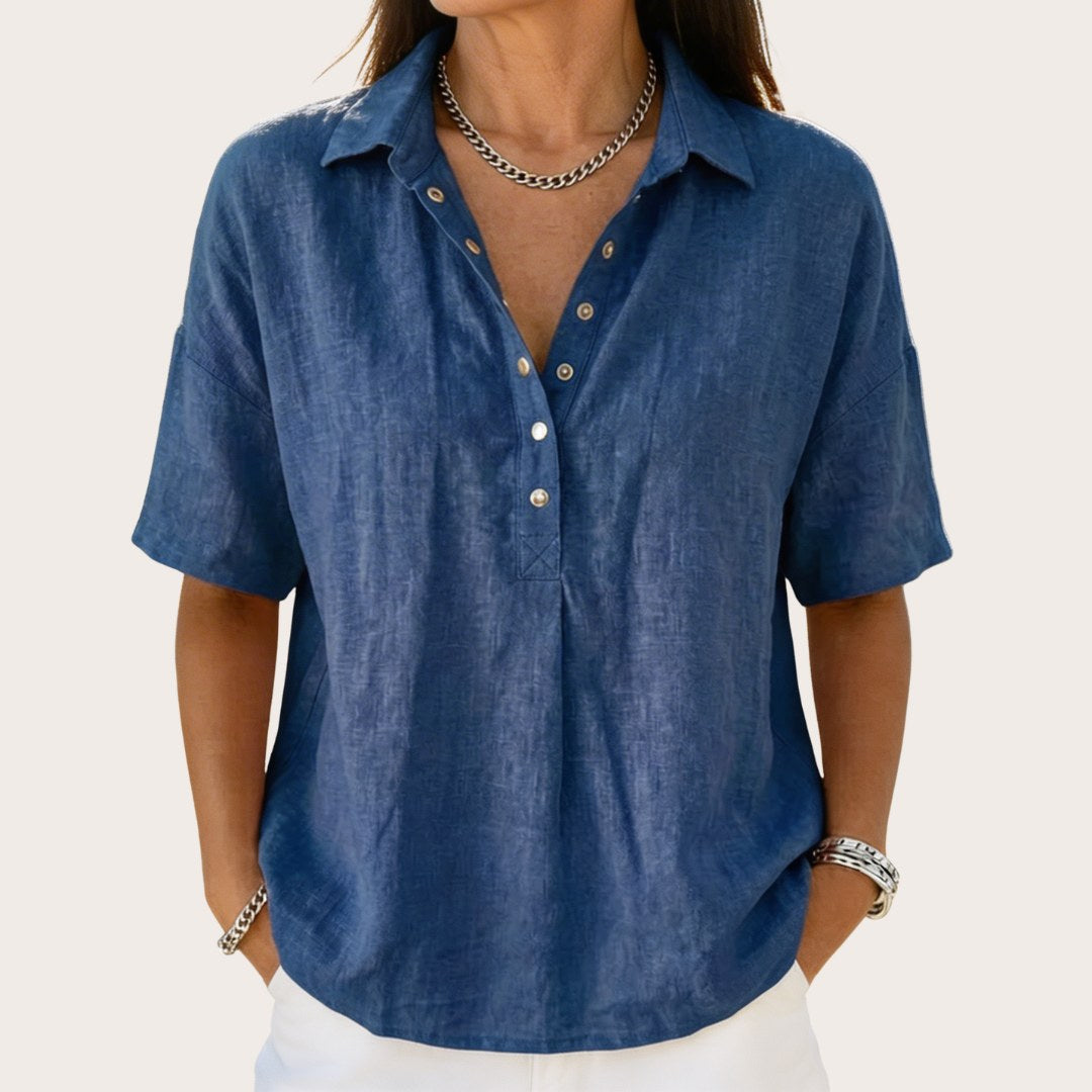 Women's classic relaxed fit button-up shirt. Everyday long-sleeve blouse, versatile for casual or chic looks.