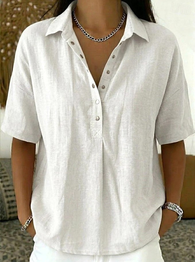 Women's collared button-up shirt. Relaxed fit, long-sleeve blouse for classic everyday & versatile styling.