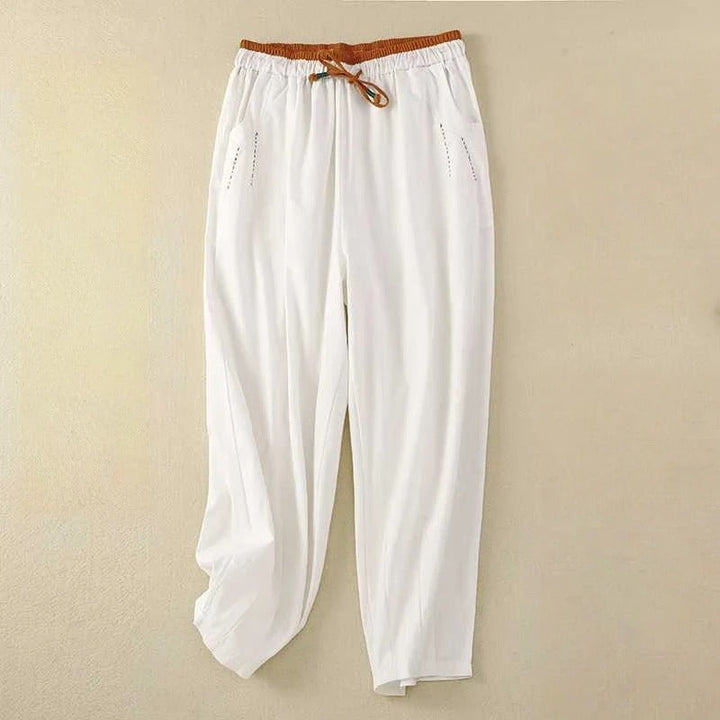 Women's effortless white drawstring relaxed pants, perfect for casual summer wear or comfortable lounging.