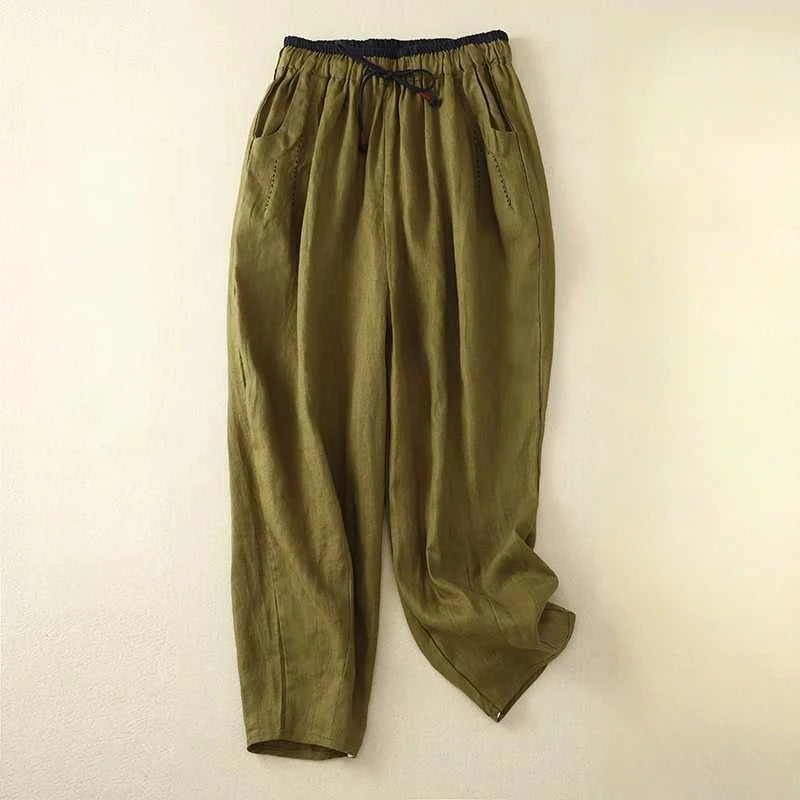 Comfortable white women's drawstring pants with a relaxed, loose fit. Ideal for lounge wear or summer casual style.