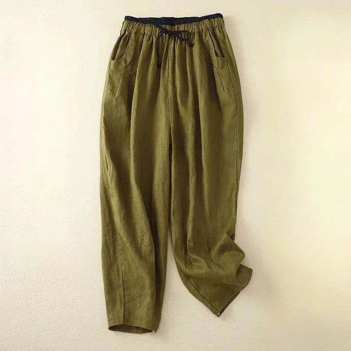 Comfortable white women's drawstring pants with a relaxed, loose fit. Ideal for lounge wear or summer casual style.