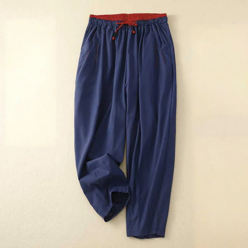 Easy fit white women's drawstring trousers, relaxed and comfortable for versatile summer outfits and lounge wear.