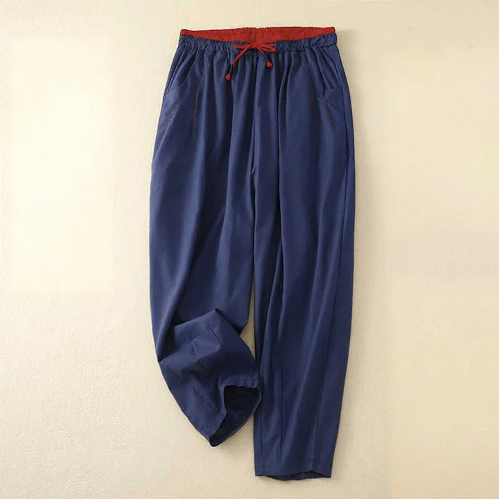 Easy fit white women's drawstring trousers, relaxed and comfortable for versatile summer outfits and lounge wear.