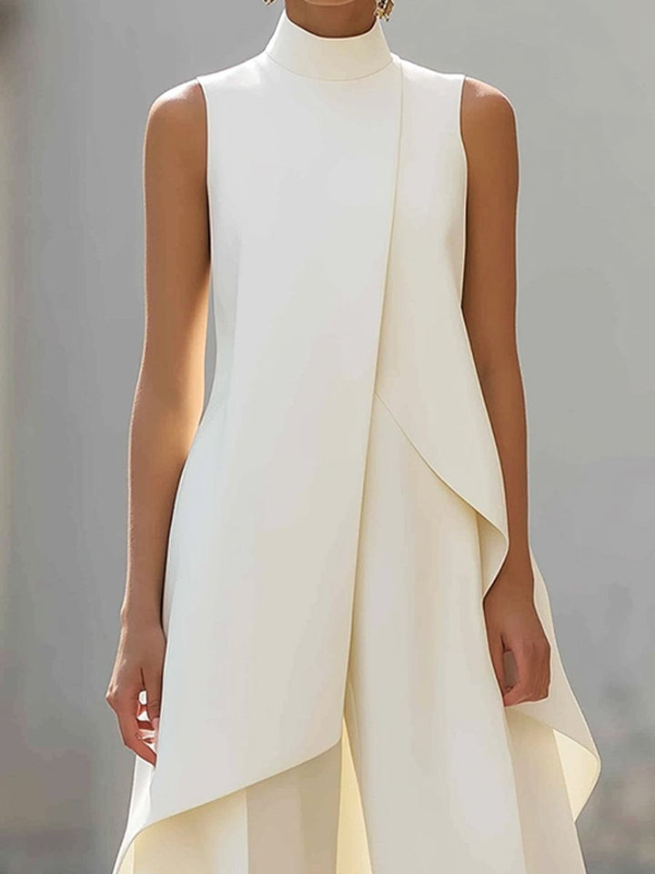 Sophisticated women's high-neck asymmetric top and wide-leg trousers co-ord set, perfect for evening.