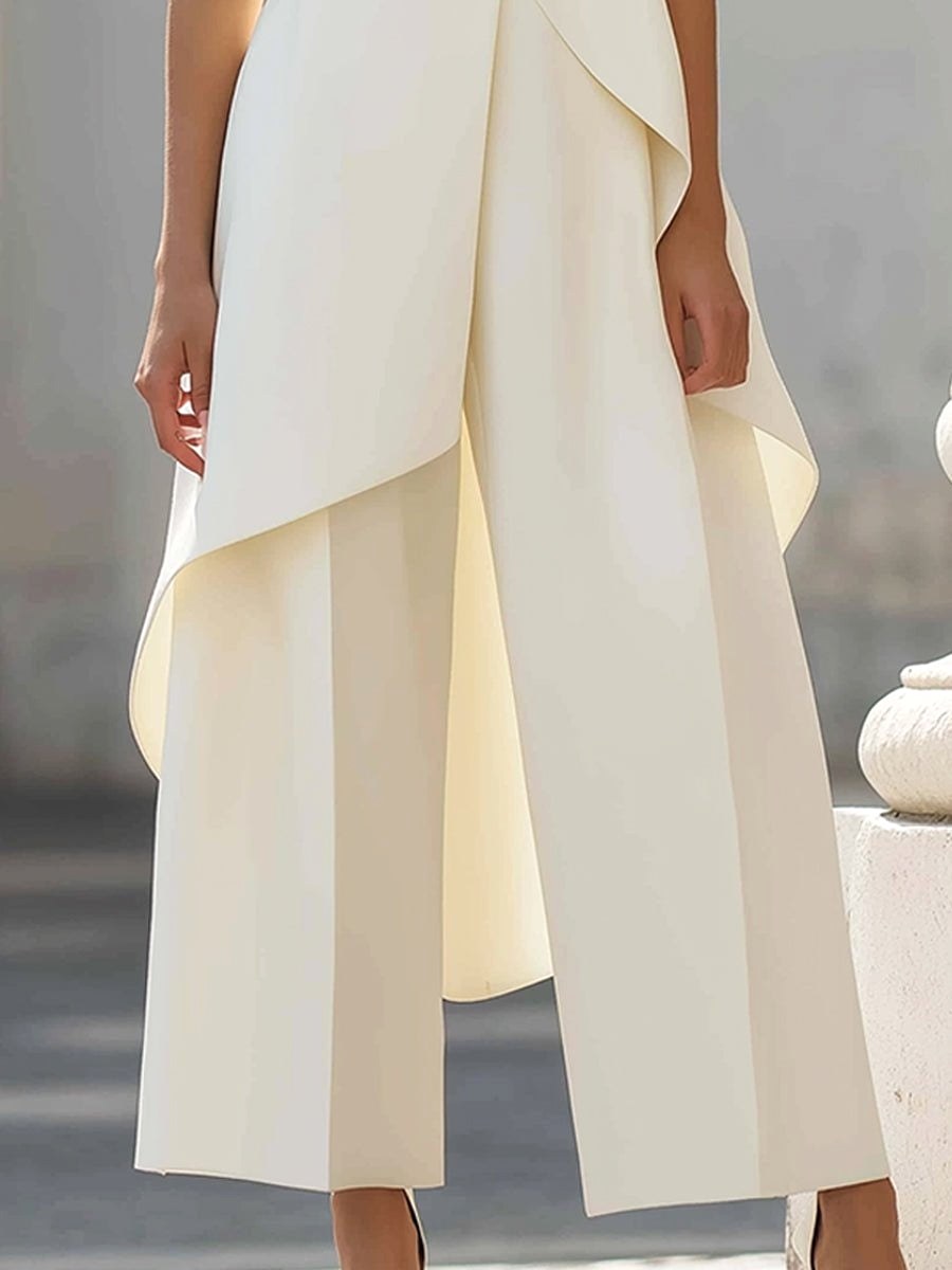 Professional women's two-piece trouser suit featuring a high-neck asymmetric top & wide-leg pants.