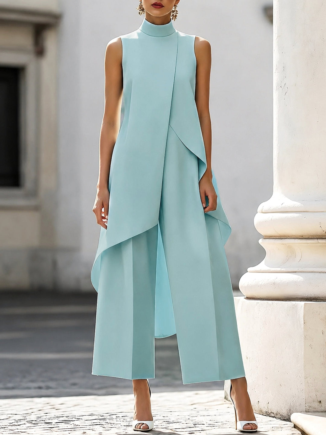 Elegant women's high-neck asymmetric top & wide-leg trouser suit, sophisticated for professional fashion.