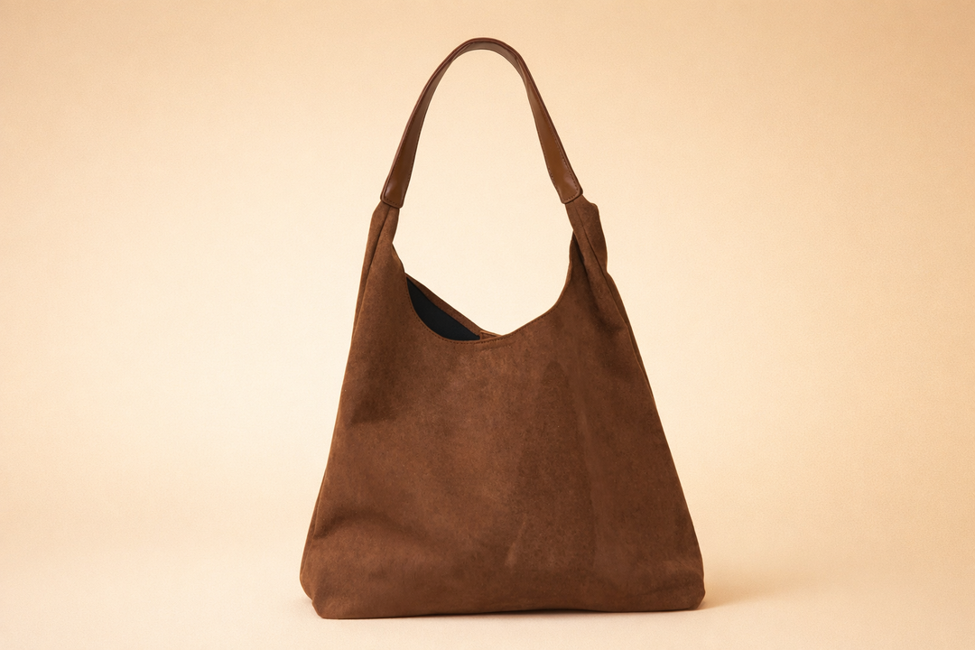 Soft suede hobo bag for women. Minimalist shoulder handbag, ideal for a comfortable and stylish daily carry.