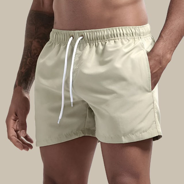 Men's quick-dry swim shorts, perfect for beach & pool. Essential summer active wear for vacation.