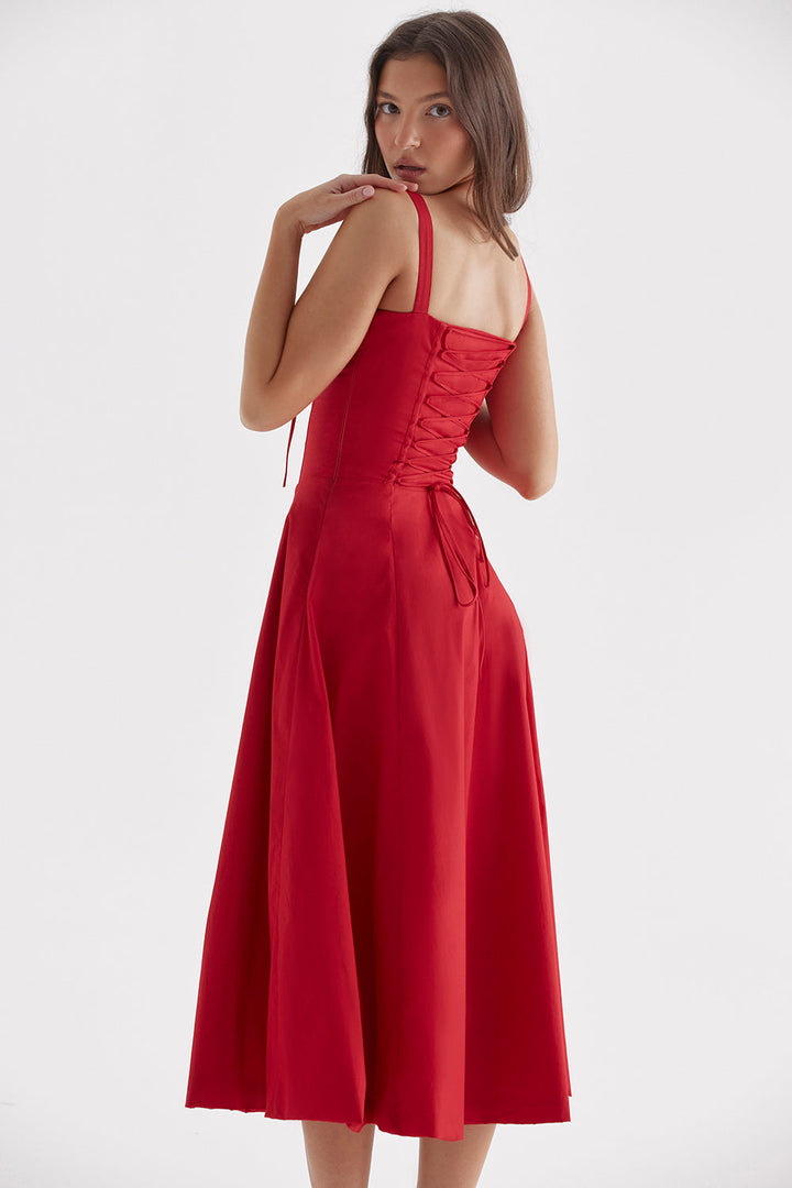 Model showcasing an elegant, versatile bustier floral dress with a flattering waist-shaping silhouette.