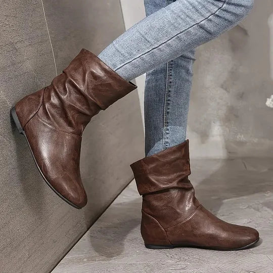 Effortless style with women's chic leather slouch boots. Comfortable, elegant mid-calf with a sophisticated pointed toe.