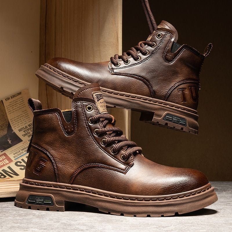 Men's rugged leather lace-up boots, featuring strong traction grip for outdoor adventures & comfortable daily wear.