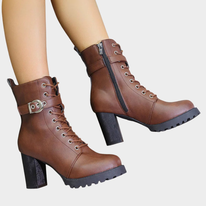 Versatile women's lace-up combat boots with a strong block heel. Perfect for fall and winter fashion.