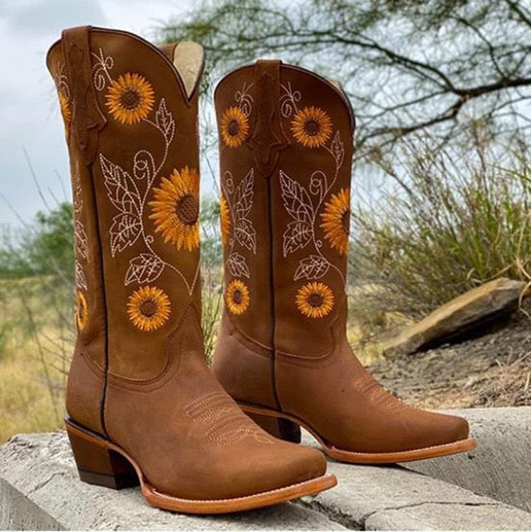 Fashionable women's boho cowboy boots with intricate sunflower embroidery, wide calf, and comfortable fit.