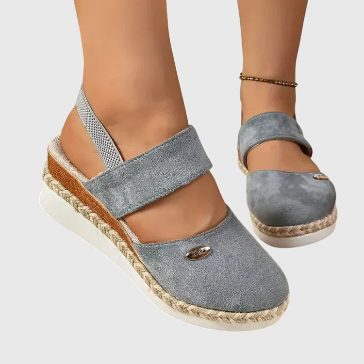 Orthopedic women's sandals with soft cushioned sole, designed for supportive everyday comfort.