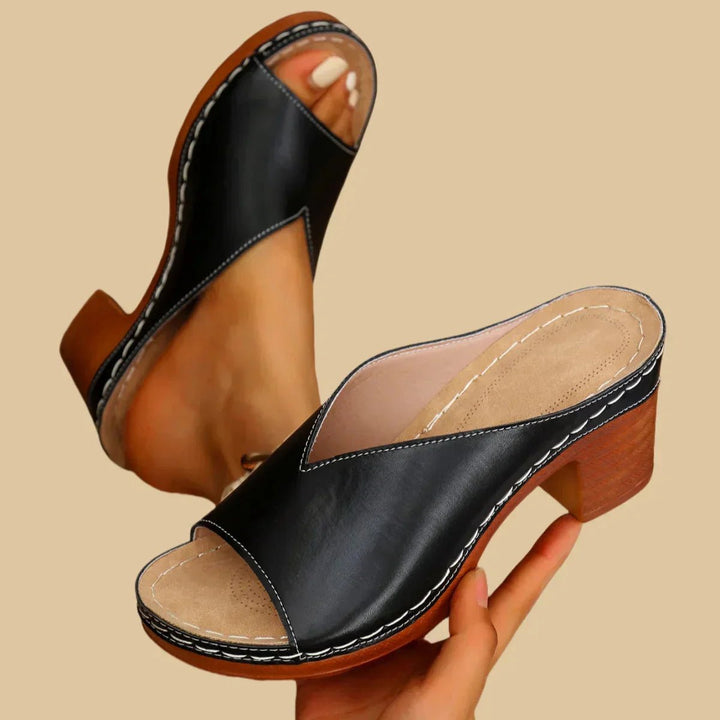 Slip-on block heel sandals for women, designed for all-day comfort. Stylish orthopedic footwear for summer.