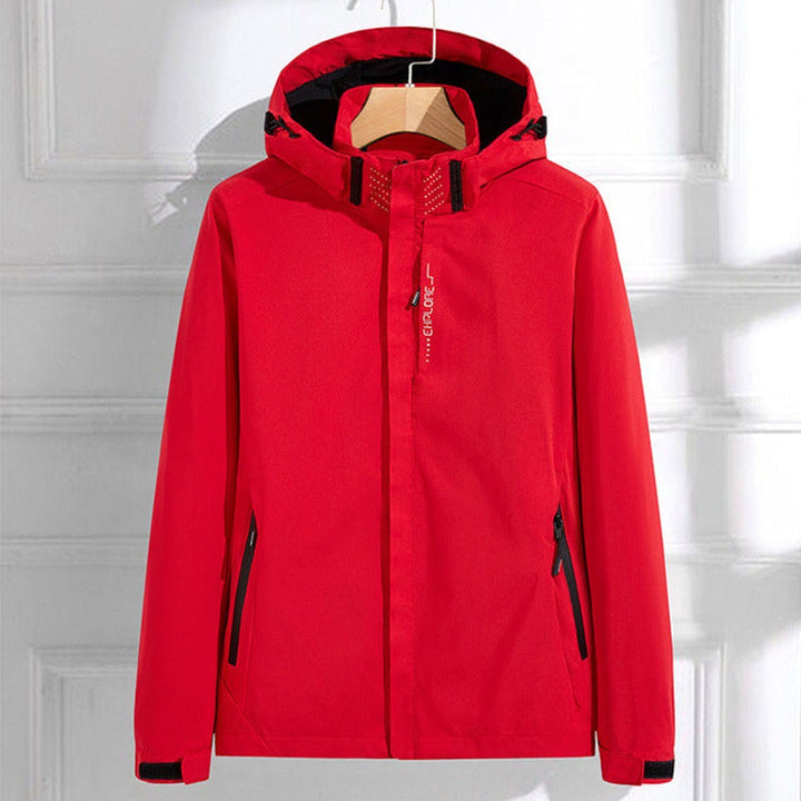 Stylish women's hooded rain jacket, ideal for spring & fall. Lightweight, waterproof, and adjustable for comfort.