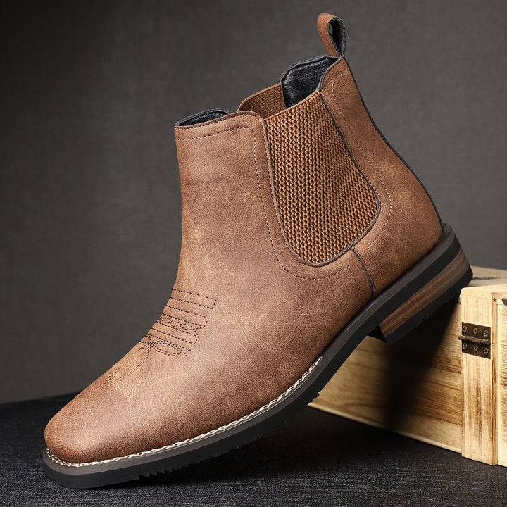 Classic men's versatile slip-on Chelsea boots. Sleek design, comfortable for daily wear, smart-casual appeal.