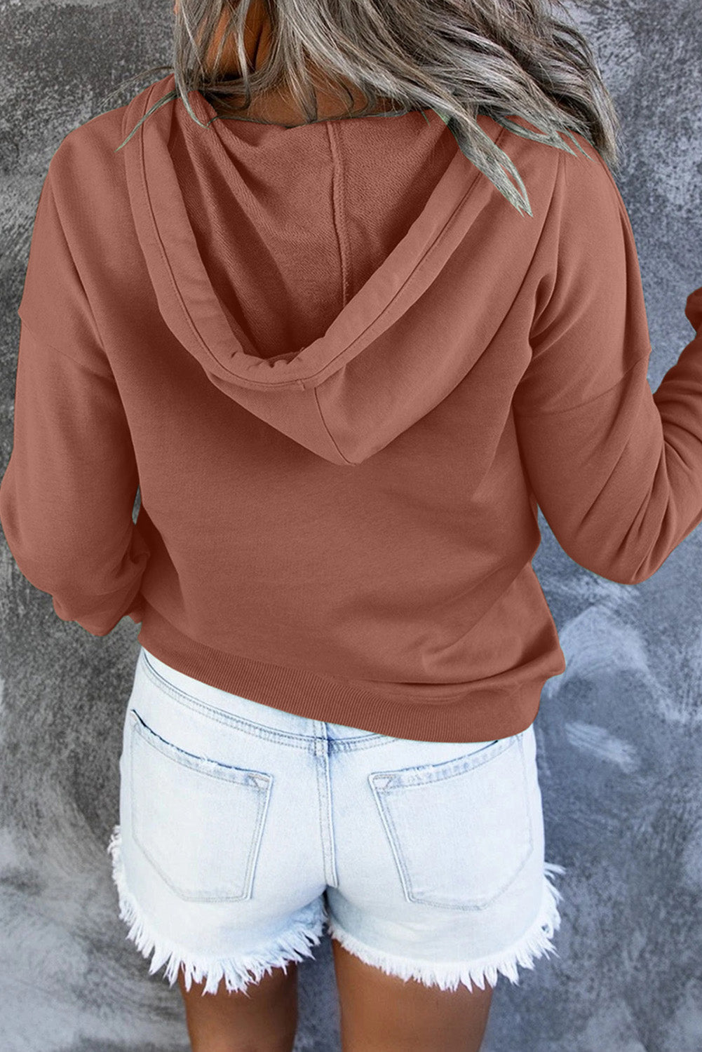 Effortlessly stylish women's hooded sweater, perfect for casual occasions & everyday comfort.