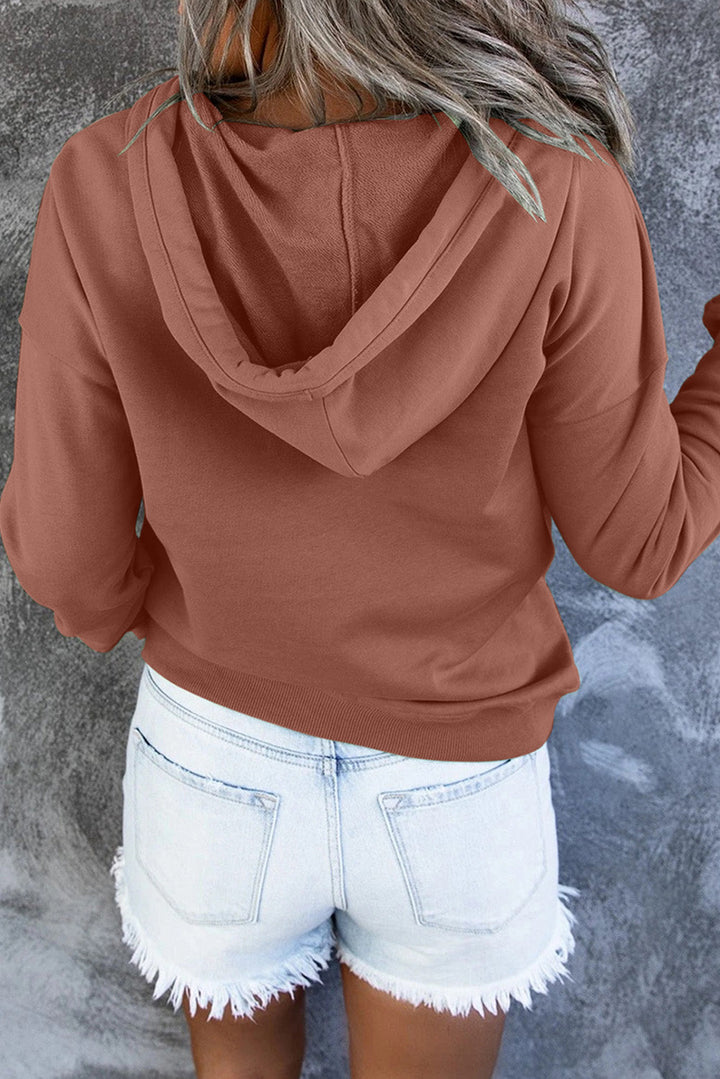 Effortlessly stylish women's hooded sweater, perfect for casual occasions & everyday comfort.